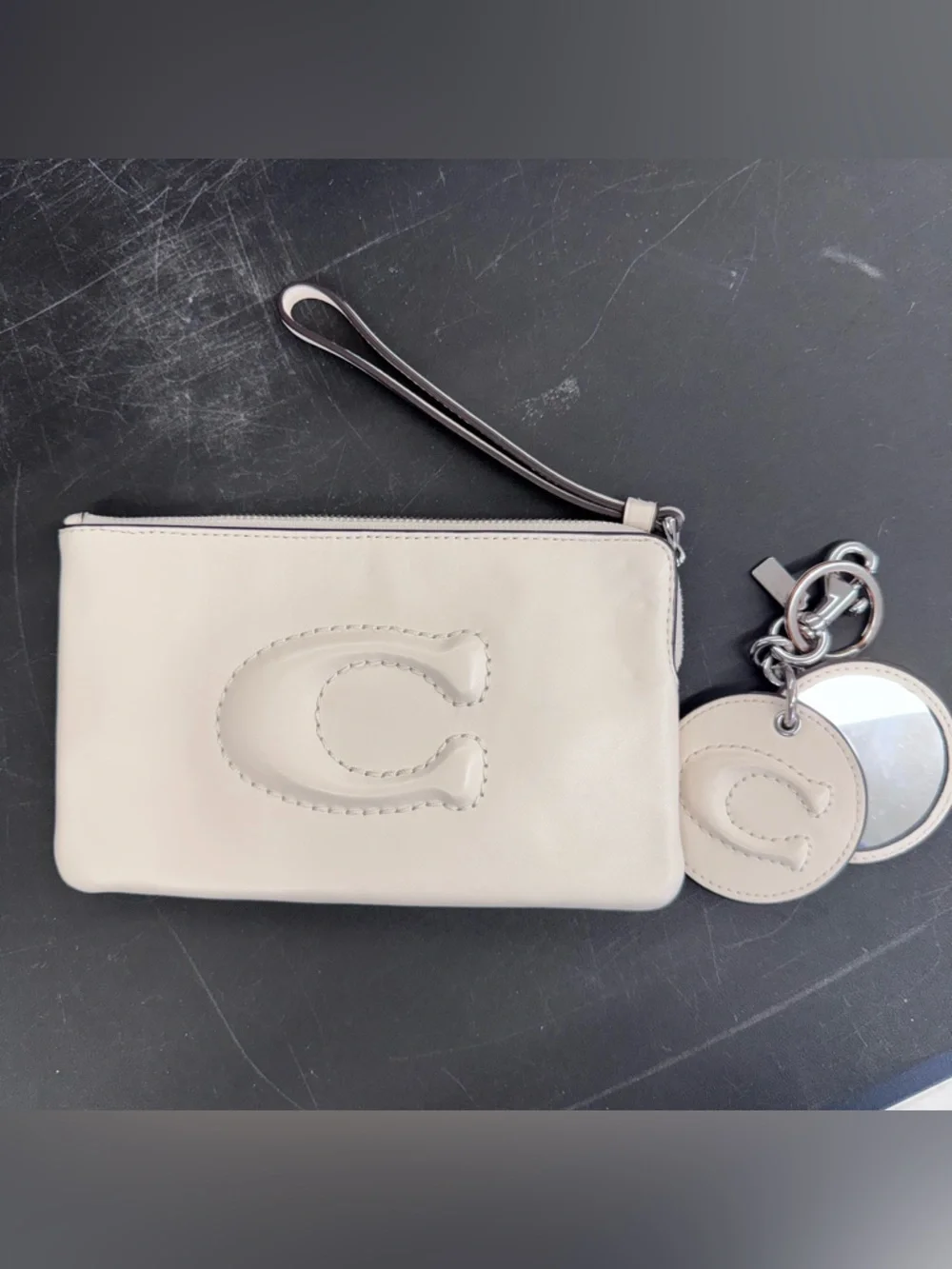 Coach Cream Leather Wristlet with Logo Charm